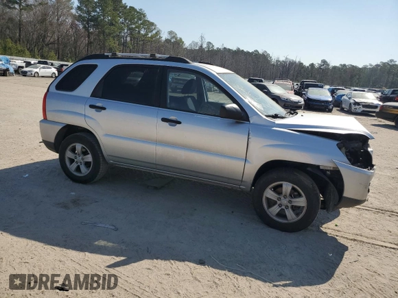 2010 Kia Sportage LX with VIN KNDKG3A40A7700990, listed as a Copart auction lot 48941505 with 38,182 mi miles and Salvage Title. Bid and sale history available at carsss.com. Image 4.