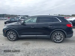 2017 Lincoln MKX Reserve with VIN 2LMPJ6LR0HBL16324, listed as a IAAI auction lot 41157696 with 118,028 mi miles. Bid and sale history available at carsss.com. Image 14.