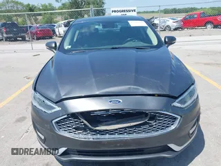 2020 Ford Fusion Titanium with VIN 3FA6P0D9XLR131042, listed as a IAAI auction lot 42560444 with 95,351 mi miles and . Bid and sale history available at DreamBid. Image 12.
