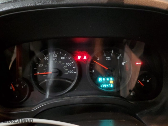 2010 Jeep Patriot Sport with VIN 1J4NF2GBXAD523005, listed as a Copart auction lot 64649124 with 179,478 mi miles and Clean Title. Bid and sale history available at carsss.com. Image 9.