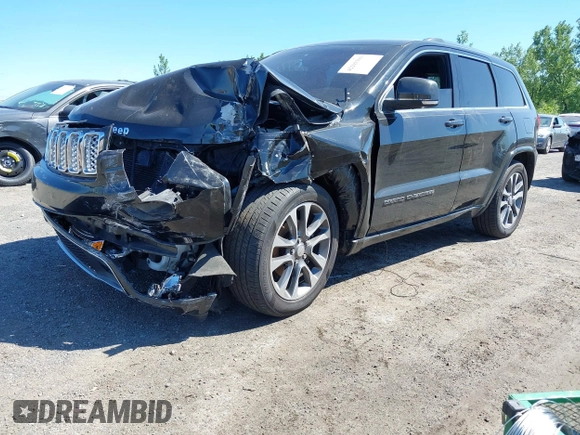 2017 Jeep Grand Cherokee Overland with VIN 1C4RJFCG0HC844713, listed as a IAAI auction lot 42293301 with 83,791 mi miles and . Bid and sale history available at DreamBid. Image 19.