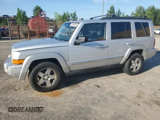 2010 Jeep Commander Sport with VIN 1J4RG4GK4AC125711, listed as a Copart auction lot 60369545 with 209,522 mi miles and Clean title. Bid and sale history available at DreamBid. Image 1.