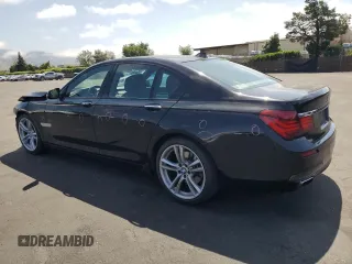 2013 BMW 7 Series 740i with VIN WBAYA6C58DC994974, listed as a Copart auction lot 55534645 with 106,975 mi miles and Salvage title. Bid and sale history available at DreamBid. Image 2.