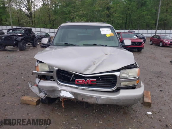 2004 GMC Yukon SLT z VIN 1GKEC13Z24J260630, wystawiony jako IAAI lot #41972913 z przebiegiem 329 286 mil mil oraz . Historia ofert i sprzedaży dostępna na DreamBid. Obrazek 6.