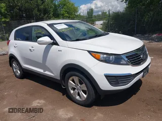 2012 Kia Sportage LX with VIN KNDPBCA23C7279997, listed as a IAAI auction lot 42622162 with 159,779 mi miles and . Bid and sale history available at DreamBid. Image 1.