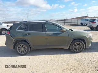 2021 Jeep Cherokee Latitude Lux with VIN 1C4PJLMX1MD221030, listed as a IAAI auction lot 41160799 with 121,011 mi miles. Bid and sale history available at carsss.com. Image 13.