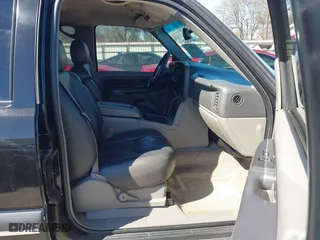 2003 Chevrolet Tahoe LS with VIN 1GNEC13V63R245581, listed as a IAAI auction lot 41599241 with 234,028 mi miles. Bid and sale history available at carsss.com. Image 5.