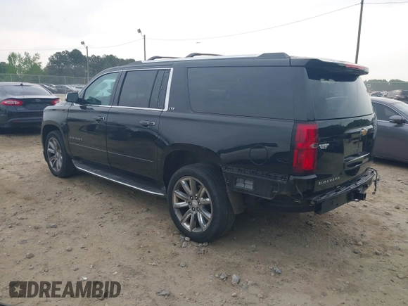 2015 Chevrolet Suburban LTZ with VIN 1GNSCKKCXFR731873, listed as a IAAI auction lot 42069917 with 108,963 mi miles and . Bid and sale history available at DreamBid. Image 3.