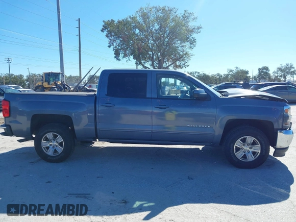 2016 Chevrolet Silverado 1500 LT with VIN 3GCUKREC8GG219524, listed as a IAAI auction lot 41087657 with 123,010 mi miles and . Bid and sale history available at DreamBid. Image 13.