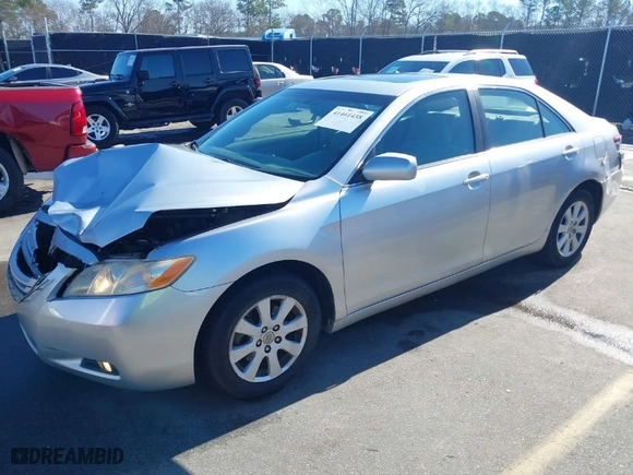 2007 Toyota Camry CE with VIN JTNBE46K973037322, listed as a IAAI auction lot 41461438 with 153,723 mi miles. Bid and sale history available at carsss.com. Image 2.