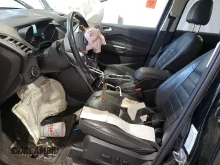 2016 Ford Escape Titanium with VIN 1FMCU0J91GUB09161, listed as a Copart auction lot 50027315 with 106,784 mi miles and Salvage Title. Bid and sale history available at carsss.com. Image 7.