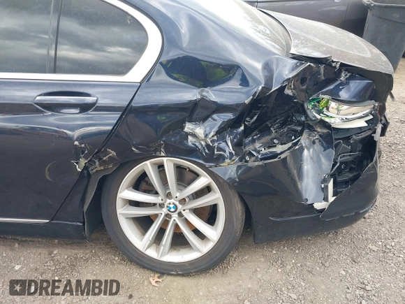 2016 BMW 7 Series 750i xDrive with VIN WBA7F2C58GG418482, listed as a IAAI auction lot 41931831 with 97,776 mi miles and . Bid and sale history available at DreamBid. Image 6.