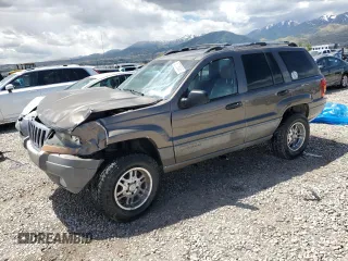 1999 Jeep Grand Cherokee Laredo z VIN 1J4GW58S5XC612309, wystawiony jako Copart lot #56705085 z przebiegiem 200 004 mil mil oraz Szkoda całkowita • Salvage title. Historia ofert i sprzedaży dostępna na DreamBid. Obrazek 1.