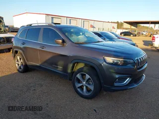 2020 Jeep Cherokee Limited with VIN 1C4PJLDN0LD552064, listed as a IAAI auction lot 41567994 with 74,816 mi miles. Bid and sale history available at carsss.com. Image 1.