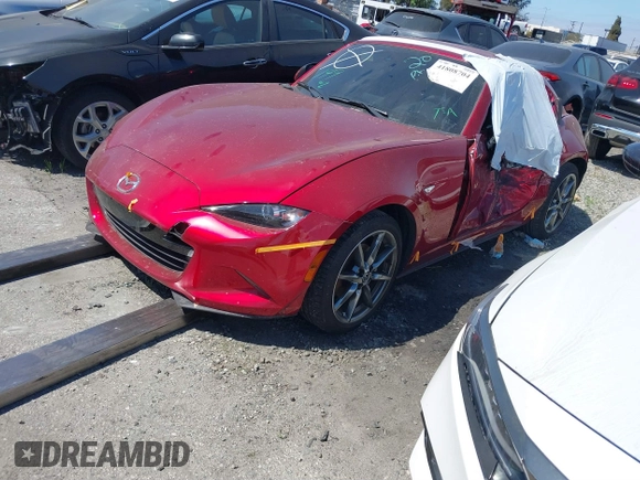 2021 Mazda MX-5 Miata Grand Touring с VIN JM1NDAM71M0459437, выставлен на аукционе IAAI как лот 41808704 с пробегом 19 368 миль миль и . История ставок и продаж доступна на DreamBid. Изображение 23.