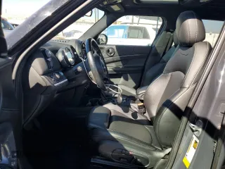 2018 MINI Countryman Cooper S with VIN WMZYT3C39J3E93214, listed as a Copart auction lot 77655444 with 101,401 mi miles and Salvage Title. Bid and sale history available at carsss.com. Image 7.