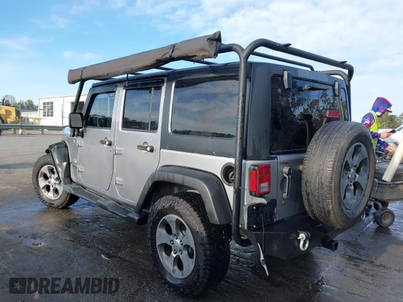 2016 Jeep Wrangler Unlimited 75th Anniversary with VIN 1C4HJWEGXGL149548, listed as a IAAI auction lot 41918007 with 254,655 mi miles. Bid and sale history available at carsss.com. Image 3.