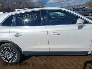 2016 Lincoln MKX Reserve with VIN 2LMTJ8LR4GBL44989, listed as a IAAI auction lot 41684823 with 101,528 mi miles. Bid and sale history available at carsss.com. Image 13.