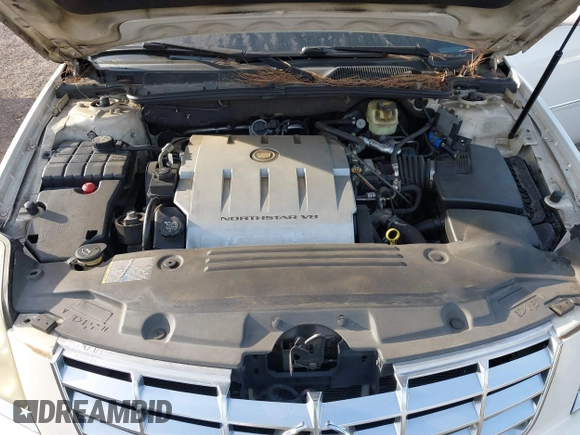 2006 Cadillac DTS w/1SC with VIN 1G6KD57Y56U132648, listed as a IAAI auction lot 41862030 with 128,003 mi miles. Bid and sale history available at carsss.com. Image 10.