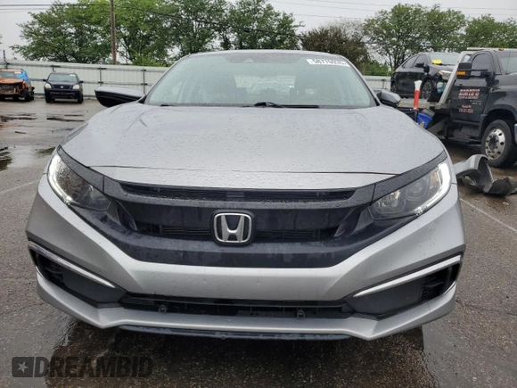 2020 Honda Civic LX with VIN 19XFC2F63LE026869, listed as a Copart auction lot 58776935 with 60,507 mi miles and Salvage title. Bid and sale history available at DreamBid. Image 5.