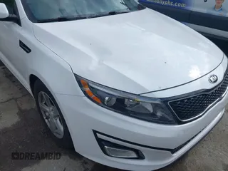 2015 Kia Optima LX with VIN KNAGM4A79F5555866, listed as a IAAI auction lot 42223745 with 115,504 mi miles and . Bid and sale history available at DreamBid. Image 6.