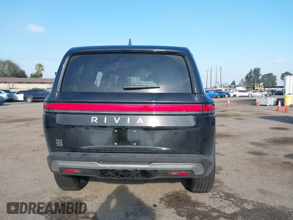 2025 Rivian R1S Adventure with VIN 7PDSGBBAXSN055849, listed as a IAAI auction lot 41255282 with 2,885 mi miles. Bid and sale history available at carsss.com. Image 17.