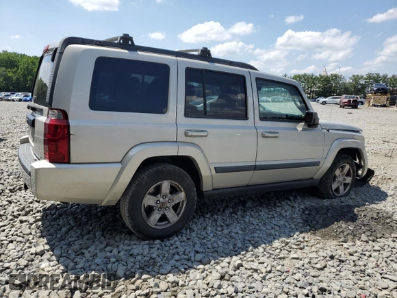 2007 Jeep Commander Sport z VIN 1J8HG48K67C651209, wystawiony jako Copart lot #64049035 z przebiegiem 216 628 mil mil oraz Szkoda całkowita • Salvage title. Historia ofert i sprzedaży dostępna na DreamBid. Obrazek 3.