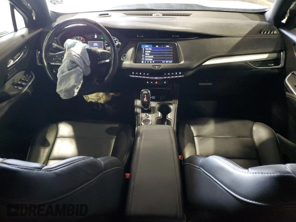 2021 Cadillac XT4 FWD Premium Luxury z VIN 1GYFZCR44MF024208, wystawiony jako Copart lot #46047425 z przebiegiem 40 044 mil mil oraz Nie do naprawy • Non repairable. Historia ofert i sprzedaży dostępna na DreamBid. Obrazek 8.