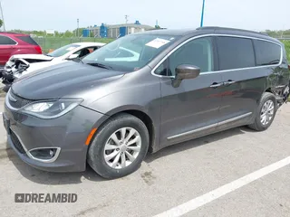 2017 Chrysler Pacifica Touring L with VIN 2C4RC1BG1HR540246, listed as a IAAI auction lot 42107768 with 151,268 mi miles and . Bid and sale history available at DreamBid. Image 17.