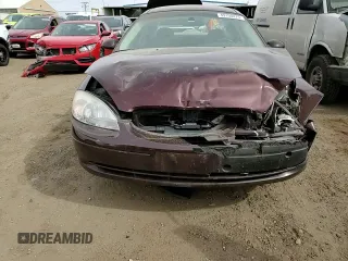 2001 Ford Taurus SES with VIN 1FAFP55S61G184193, listed as a Copart auction lot 49190475 with 129,415 mi miles and Salvage Title. Bid and sale history available at DreamBid. Image 11.