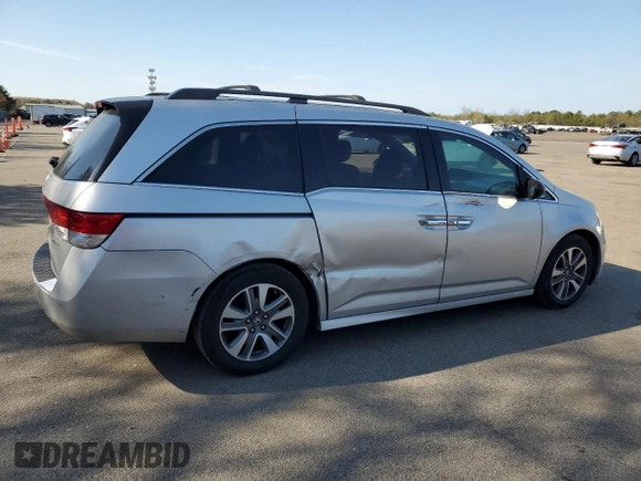2014 Honda Odyssey Touring with VIN 5FNRL5H94EB094357, listed as a Copart auction lot 53930635 with 210,448 mi miles and Salvage Title. Bid and sale history available at carsss.com. Image 3.