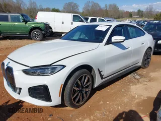 2023 BMW i4 eDrive40 z VIN WBY73AW08PFN72118, wystawiony jako IAAI lot #41849570 z przebiegiem 27 118 mil mil oraz . Historia ofert i sprzedaży dostępna na DreamBid. Obrazek 2.