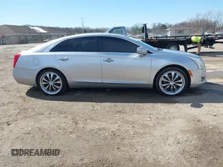 2013 Cadillac XTS Luxury with VIN 2G61R5S34D9233991, listed as a IAAI auction lot 41825533 with 152,706 mi miles. Bid and sale history available at carsss.com. Image 13.