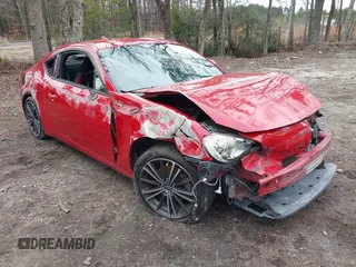 2015 Scion FR-S z VIN JF1ZNAA10F9711357, wystawiony jako IAAI lot #41225577 z przebiegiem 129 747 mil mil oraz . Historia ofert i sprzedaży dostępna na DreamBid. Obrazek 1.