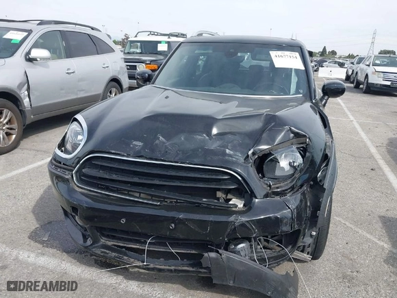 2020 MINI Countryman Cooper with VIN WMZYW3C04L3M24637, listed as a IAAI auction lot 41677154 with 34,786 mi miles. Bid and sale history available at carsss.com. Image 12.