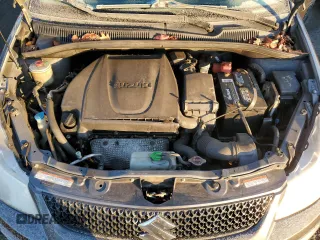 2010 Suzuki SX4 with VIN JS2YB5A31A6300055, listed as a Copart auction lot 82596904 with 80,715 mi miles and Salvage Title. Bid and sale history available at carsss.com. Image 11.