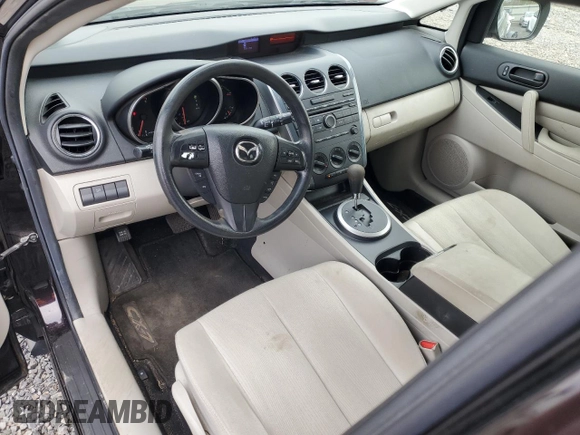 2010 Mazda CX-7 SV z VIN JM3ER2WMXA0341433, wystawiony jako Copart lot #53474815 z przebiegiem 106 410 mil mil oraz Czysty tytuł • Clean title. Historia ofert i sprzedaży dostępna na DreamBid. Obrazek 8.