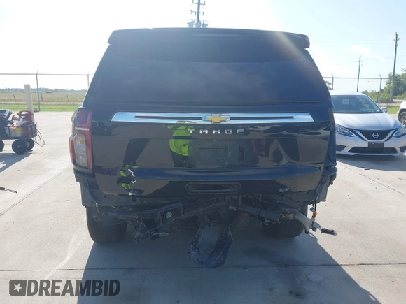 2023 Chevrolet Tahoe LT z VIN 1GNSCNKDXPR477061, wystawiony jako IAAI lot #42225743 z przebiegiem 57 077 mil mil oraz . Historia ofert i sprzedaży dostępna na DreamBid. Obrazek 16.