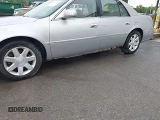 2006 Cadillac DTS 1SB z VIN 1G6KD57YX6U212463, wystawiony jako IAAI lot #42515167 z przebiegiem 186 693 mil mil oraz . Historia ofert i sprzedaży dostępna na DreamBid. Obrazek 6.