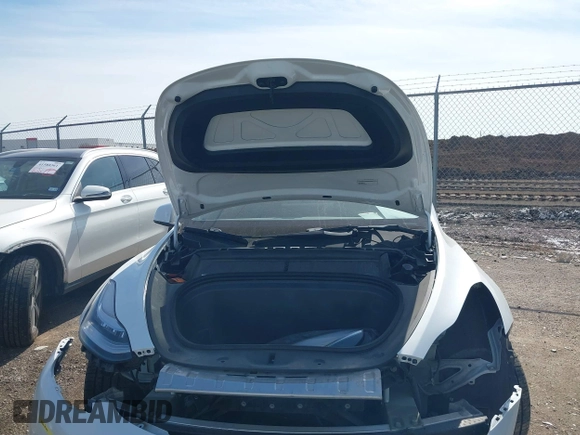 2022 Tesla Model Y Long Range with VIN 7SAYGDEE4NF428434, listed as a IAAI auction lot 41578503 with 35,460 mi miles and . Bid and sale history available at DreamBid. Image 10.