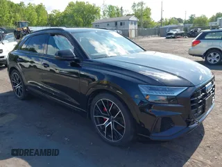 2019 Audi Q8 Premium Plus z VIN WA1EVAF16KD025777, wystawiony jako IAAI lot #42392484 z przebiegiem 31 934 mil mil oraz . Historia ofert i sprzedaży dostępna na DreamBid. Obrazek 1.