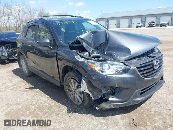 2016 Mazda CX-5 Touring with VIN JM3KE4CYXG0620990, listed as a IAAI auction lot 41978738 with 91,237 mi miles and . Bid and sale history available at carsss.com. Image 1.