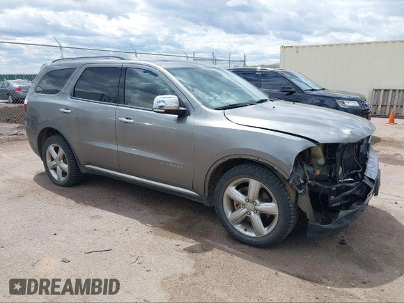 2011 Dodge Durango Citadel with VIN 1D4RE5GG5BC664579, listed as a IAAI auction lot 40812809 with 209,743 mi miles. Bid and sale history available at carsss.com. Image 1.