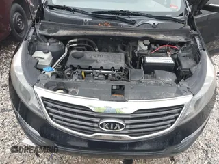2011 Kia Sportage LX with VIN KNDPB3A25B7027733, listed as a IAAI auction lot 38570270 with 186,271 mi miles and . Bid and sale history available at carsss.com. Image 10.