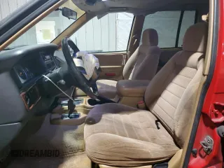 1997 Jeep Grand Cherokee Laredo with VIN 1J4GZ58Y5VC674687, listed as a Copart auction lot 43137095 with 173,228 mi miles and Salvage Title. Bid and sale history available at carsss.com. Image 7.