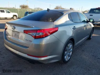 2013 Kia Optima SX w/Limited Pkg with VIN 5XXGR4A63DG124072, listed as a IAAI auction lot 40998791 with 144,696 mi miles. Bid and sale history available at carsss.com. Image 4.
