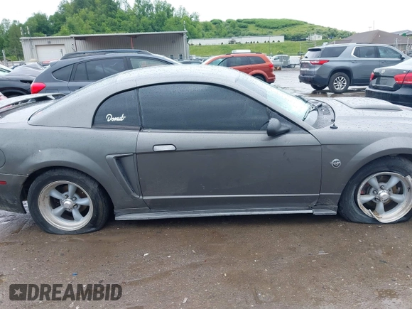 2004 Ford Mustang Standard with VIN 1FAFP40624F233811, listed as a IAAI auction lot 42330396 with 136,091 mi miles and . Bid and sale history available at DreamBid. Image 13.
