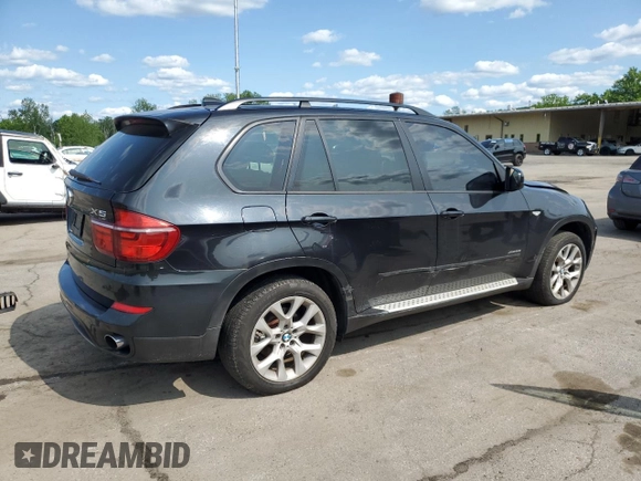 2012 BMW X5 35i with VIN 5UXZV4C59CL752661, listed as a Copart auction lot 58590305 with 101,725 mi miles and Salvage title. Bid and sale history available at DreamBid. Image 3.