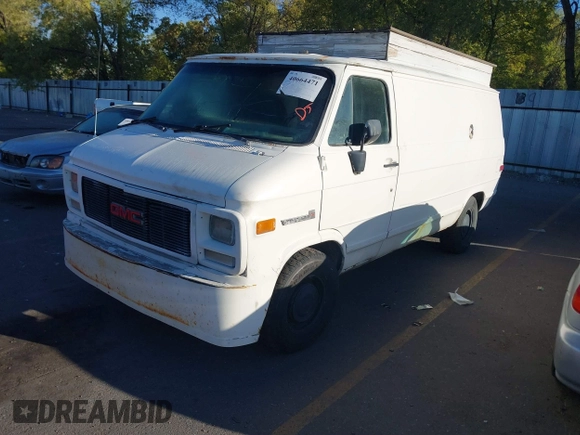 1995 GMC Vandura z VIN 1GTEG25K5SF548518, wystawiony jako IAAI lot #40664471 z przebiegiem 157 506 mil mil oraz . Historia ofert i sprzedaży dostępna na DreamBid. Obrazek 2.