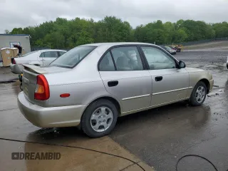 2002 Hyundai Accent GL z VIN KMHCG45C12U355561, wystawiony jako Copart lot #54546945 z przebiegiem 22 893 mil mil oraz Szkody całkowita. Historia ofert i sprzedaży dostępna na DreamBid. Obrazek 3.